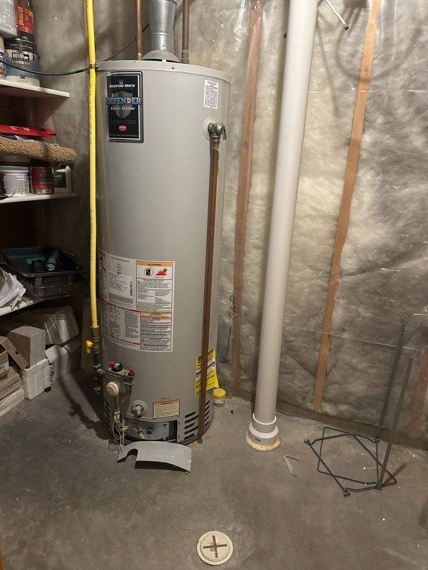 Responded to no hot water complaint in residence with a tanked water heater. Diagnostic inspection revealed pilot light was extinguished. Successfully relit pilot flame, restoring hot water functionality. Presented customer with various replacement options for consideration as the unit is showing signs of age.