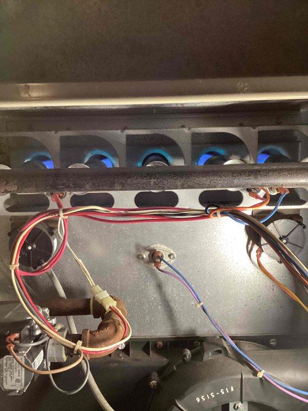 Responded to no heat call for aging furnace. Gas valve was not engaging despite receiving 24V signal. After manual agitation of the valve and testing with multimeter, successfully restored furnace operation temporarily. Customer informed that gas valve requires replacement but opted to wait for scheduled service advisor visit for replacement quotes. Customer has alternative heating sources available if system fails before repair.