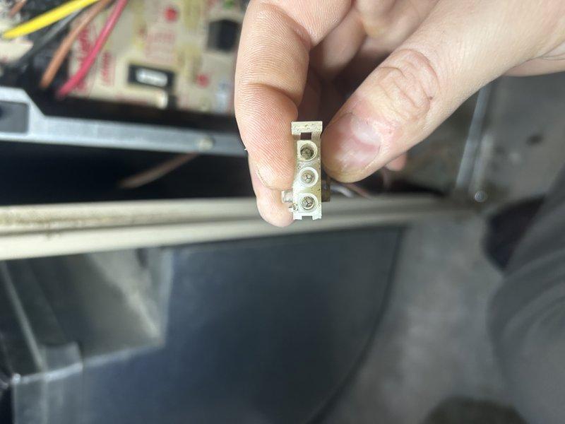 Responded to no heat call for 22-year-old furnace exhibiting short cycling. Diagnosed water intrusion in inducer motor causing intermittent operation. Removed motor, drained accumulated water, and repaired leak. Inspected heat exchanger and monitored system for 20 minutes to verify proper operation. Customer advised on potential replacement of inducer motor and informed about continued monitoring of aging system.