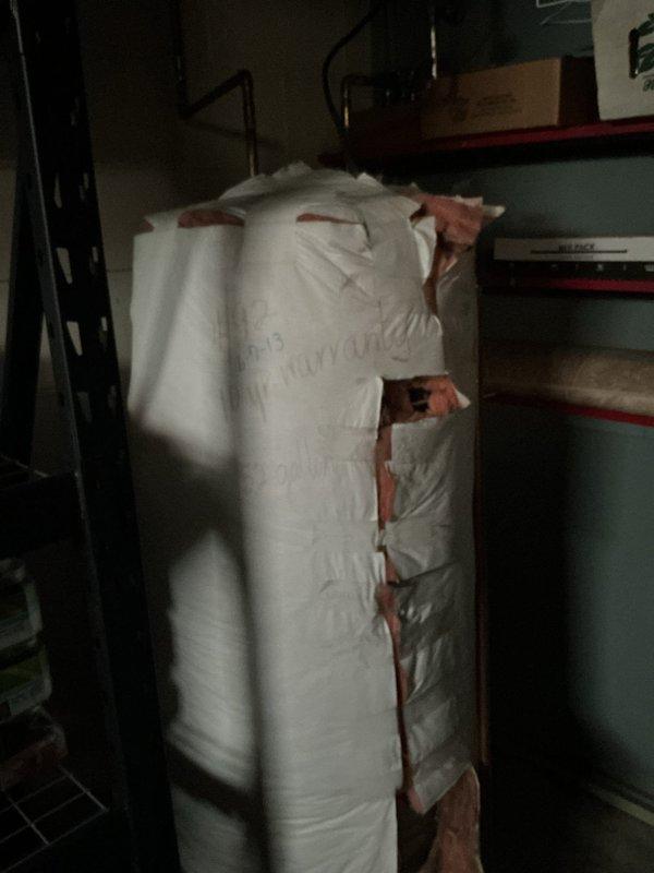 Responded to sink drainage issue and determined clog was located in galvanized piping downstairs. Successfully cleared blockage by running snake machine through the drain twice, restoring proper drainage function.