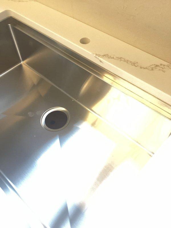 Completed installation of kitchen faucet with upgraded water supply lines and new shut-off valves. Connected plumbing to sink and installed shut-off valves for icemaker and dishwasher. Dishwasher installation was not performed as part of this service.