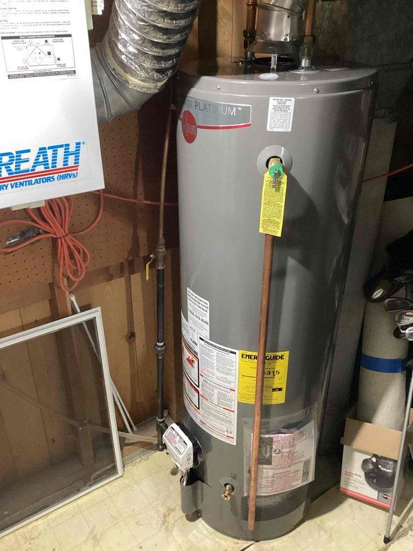 Responded to a water heater replacement request for a customer with a leaking Rheem unit. Confirmed water heater failure due to age-related deterioration. Successfully installed customer-supplied Platinum natural gas 40-gallon water heater with proper venting and copper pipe connections. Disposed of the previous unit per customer's request.