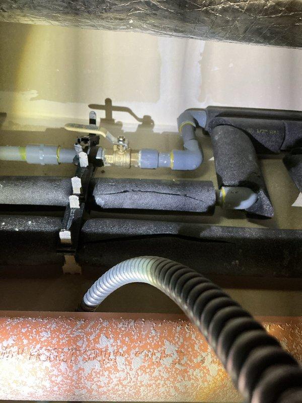 Diagnosed water heater failure caused by loose wire that resulted in electrical short, damaging the blower and main control board. Replaced defective components under warranty and verified proper operation of water heater. Inspected surrounding pipe insulation and connections to ensure no additional damage to the system.