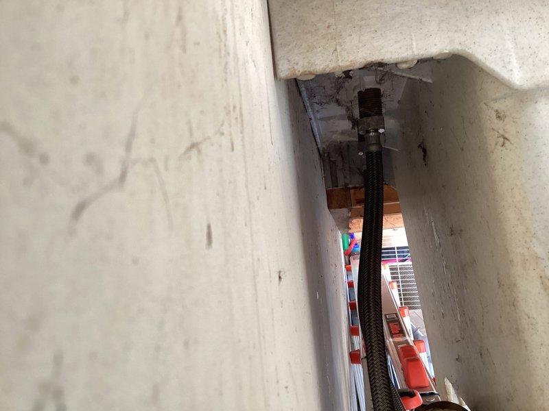 Responded to service call for water leakage from supply lines in garage laundry tub. Replaced laundry supply lines to address the immediate leak issue. Recommended installation of interior shut-off valves with drain-down capability for freeze protection, but customer opted to defer this preventative measure.