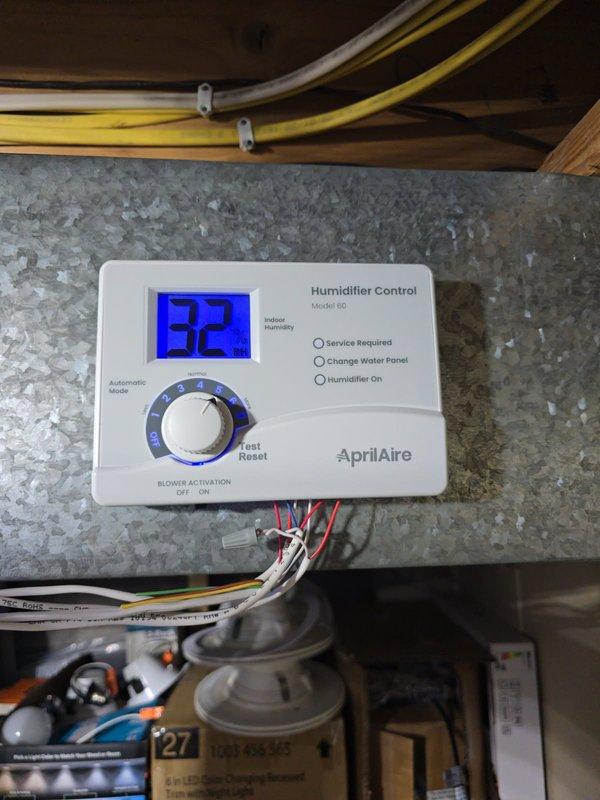 Responded to service call for customer-installed AprilAire humidifier that reportedly wasn't activating. Upon inspection, found the humidifier functioning properly and maintaining 32% humidity level. Verified system operation through both the AprilAire Model 60 control panel and the ecobee thermostat (displaying 33% humidity). Noted control interface was intermittently unresponsive; advised customer to contact AprilAire for replacement of control unit under warranty. No repairs needed at this time.