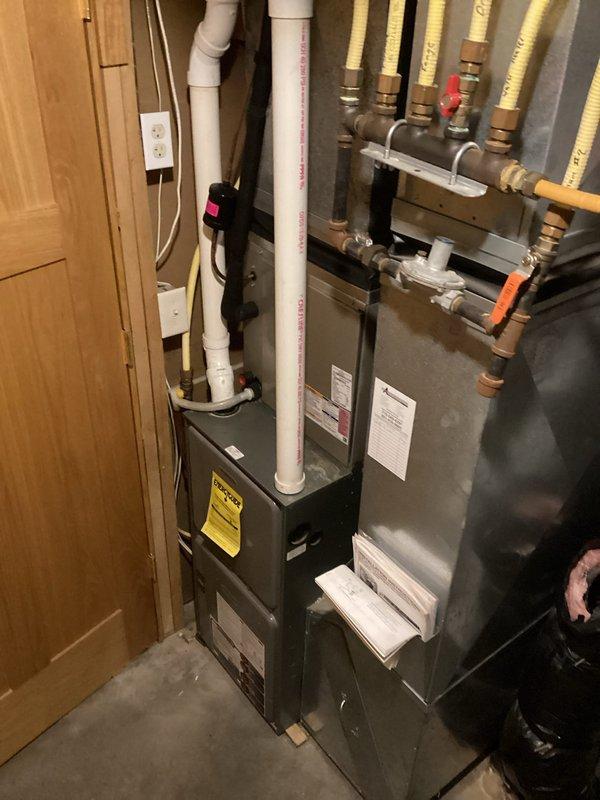 Successfully completed replacement of 50-gallon Bradford White natural gas standard vent water heater. Addressed initial atmospheric venting issue by applying heat to the flue and first four feet of piping with a hairdryer, which resolved the problem and established proper ventilation. Installation included all necessary connections to existing gas and water lines.