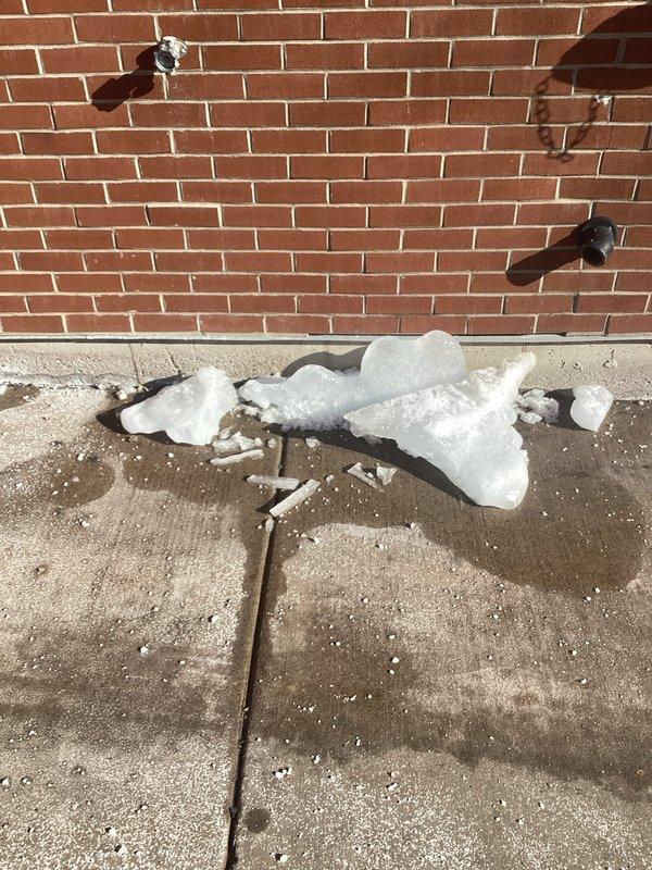 Diagnosed and resolved issues with multiple A.O. Smith water heaters. Reset control board on left unit by cycling power to clear BD code. Middle water heater displayed exhaust code; removed and cleaned exhaust trap which was heavily clogged with rusted material. Both units operational after service.