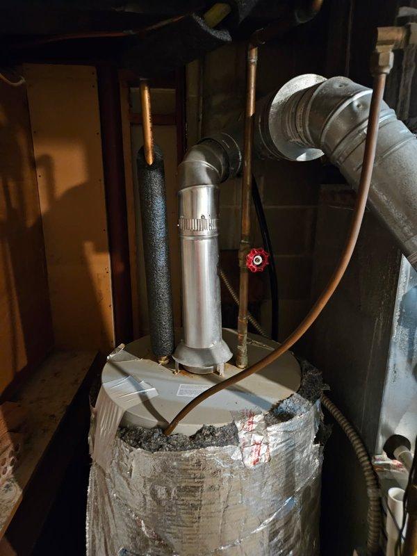 Responded to service call for water heater leaking from bottom. Upon inspection, determined tank failure with active leakage. Completed full replacement of natural gas water heater with new unit. Properly connected to existing plumbing and gas lines, ensuring proper venting through existing flue system. Unit tested and confirmed operational with no leaks.