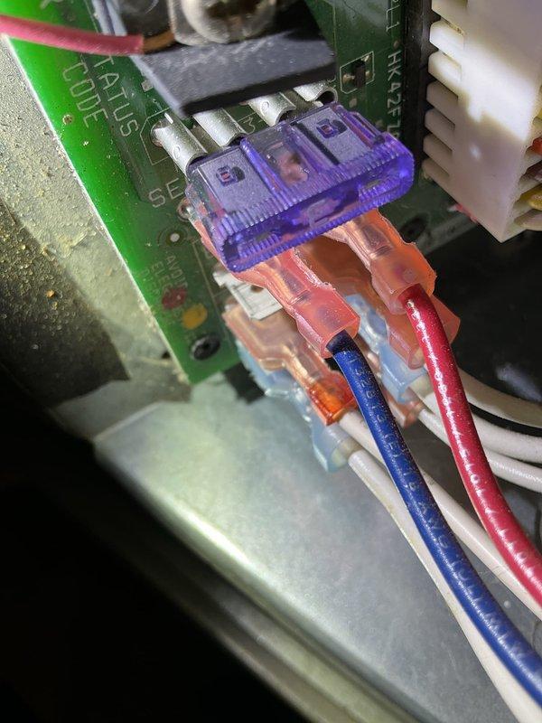 Performed diagnostic service on a 20-year-old Carrier furnace with no heat complaint. Identified failed secondary heat exchanger as primary issue, confirmed by visual inspection and photo documentation. Customer had previously reported sparks when bumping thermostat; found blown fuse caused by wiring contact during cabinet cleaning. Completed safety shutdown procedure due to heat exchanger failure. Customer opted to pursue replacement through home warranty program.