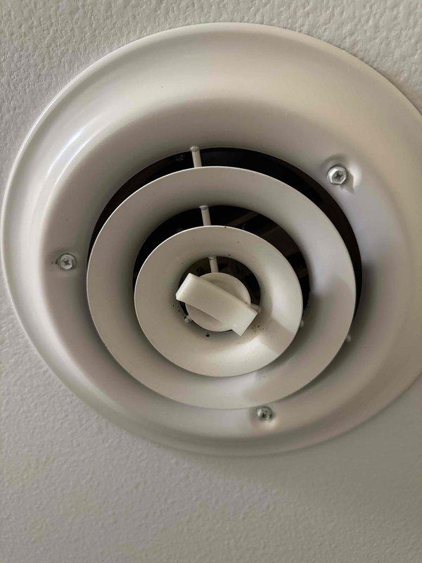 Performed comprehensive duct cleaning service to address accumulation of dust and animal hair in the HVAC system. Service included thorough cleaning of both supply and return ductwork with particular attention to ceiling-mounted circular air vents/diffusers. All fifteen openings were properly serviced to restore optimal airflow and improve indoor air quality.