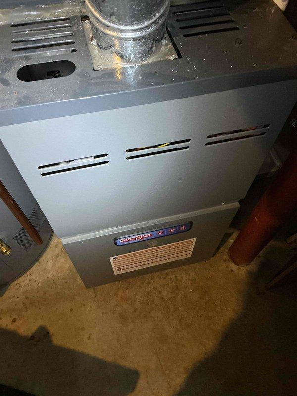 Diagnosed intermittent furnace operation in Comfortmaker unit exhibiting flame cycling issues. Inspection revealed faulty flame sensor causing system to shut down prematurely. Removed and replaced defective flame sensor to restore proper flame detection and continuous operation.