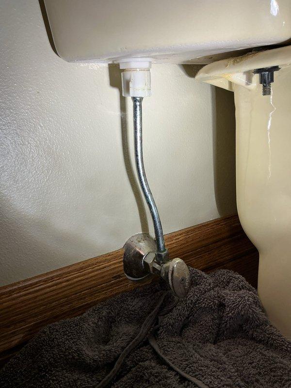Responded to customer report of toilet leak. Diagnosed water leaking from fill valve connection. Replaced fill valve and installed new supply line. Verified repair with leak check; system now functioning properly.