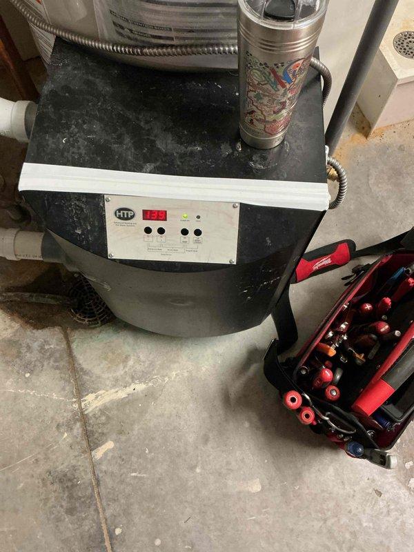 Responded to service call for water heater temperature adjustment. Upon inspection of HTP unit, found temperature defaulted to 119°F instead of required 150°F. Successfully accessed control panel and recalibrated temperature settings to restore proper hot water temperature.