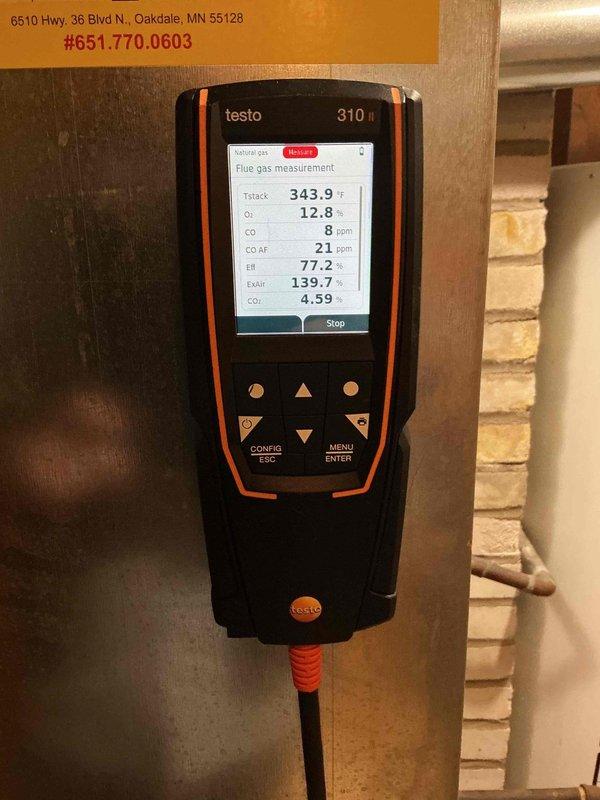 Performed comprehensive maintenance on 10-year-old Amana furnace. Verified all components functioning properly including igniter, flame sensor, gas valve, motors, and heat exchanger. Combustion analysis showed optimal performance with stack temperature at 343.9°F, CO2 at 4.59%, and efficiency at 77.2%. No safety concerns or operational issues identified.