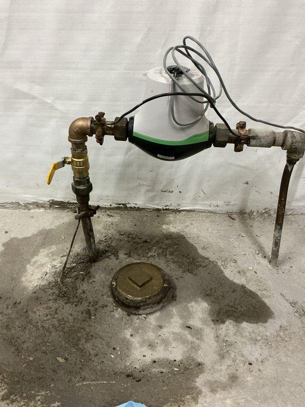 Replaced failing main water service valve before the meter and installed additional ball valve after the meter to ensure complete water shut-off capability. Both valves were successfully installed and water service was restored to the property. System now provides reliable dual shut-off points for improved water control.