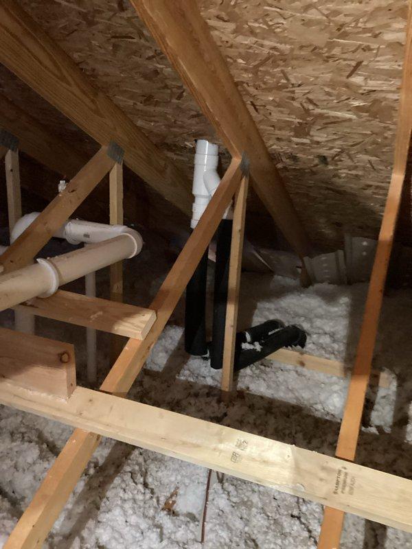 Responded to no heat call and found furnace vent pipe plugged with ice on roof, successfully cleared blockage with chisel to restore heat. Identified need to return to reslope pipe in attic and complete standard maintenance service on main house unit. Second unit in garage remains non-operational per customer report.