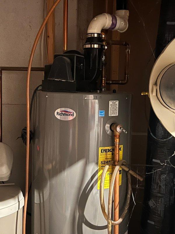 Diagnosed 40-gallon Richmond water heater experiencing insufficient hot water supply after sequential showers. Conducted visual inspection of unit, connections, and surrounding utility systems including water softener. Determined heater was undersized for household demand rather than defective; recommended upgrading to larger capacity unit to resolve cold water issues.