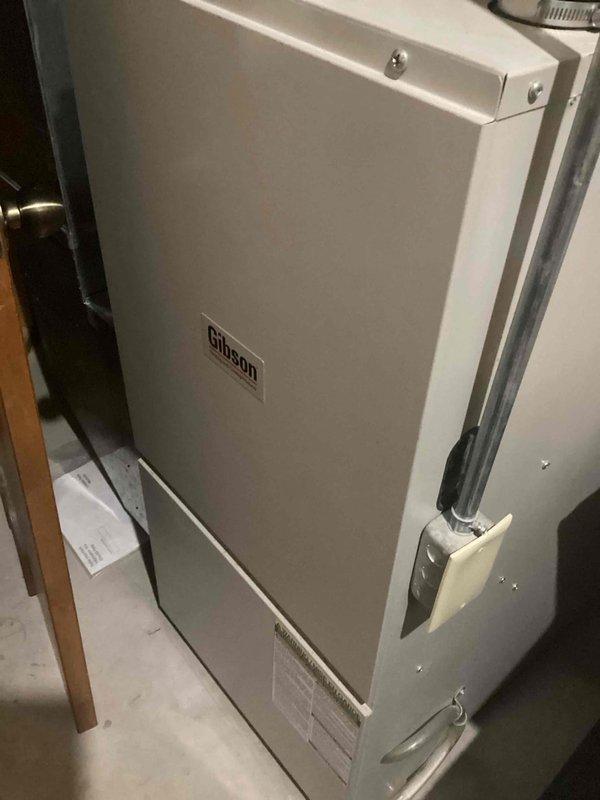 Responded to service call regarding loose kitchen faucet. Diagnosed issue as oversized hole in mounting surface causing instability. Installed large washer to secure faucet properly and provide additional support. Faucet now properly stabilized.