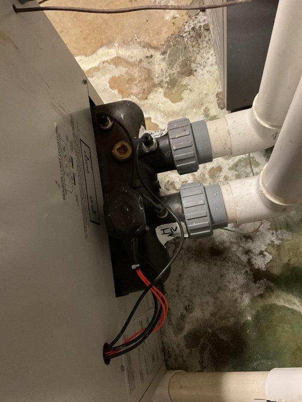 Diagnosed significant water leakage from spa heater, identifying a compromised heat exchanger as the primary issue. Observed evidence of freeze damage likely caused during recent cold temperatures, exacerbated by absence of fresh air motorized dampers that would have prevented cold air infiltration. Submitted parts requisition for either replacement heat exchanger or complete unit, noting that heat exchanger replacement would require full disassembly of the system.