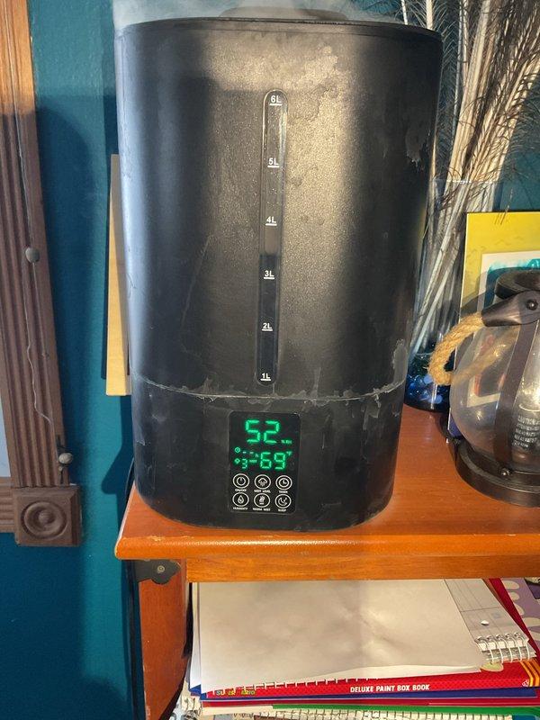 Diagnosed intermittent heating issue on 13-year-old furnace. Discovered ultrasonic humidifier was producing white dust that completely clogged the filter, causing furnace to overheat. Inspected heat exchanger (found in good condition), replaced filter, and tightened components. System now operating properly with correct temperature rise.