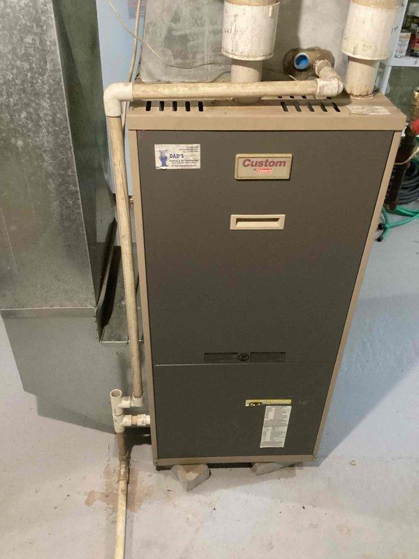 Responded to service call regarding 25-year-old furnace producing loud rattling noise from blower assembly. Diagnostic inspection revealed significant wear in the blower wheel and motor. Replaced both blower motor and wheel to eliminate noise and restore proper operation.