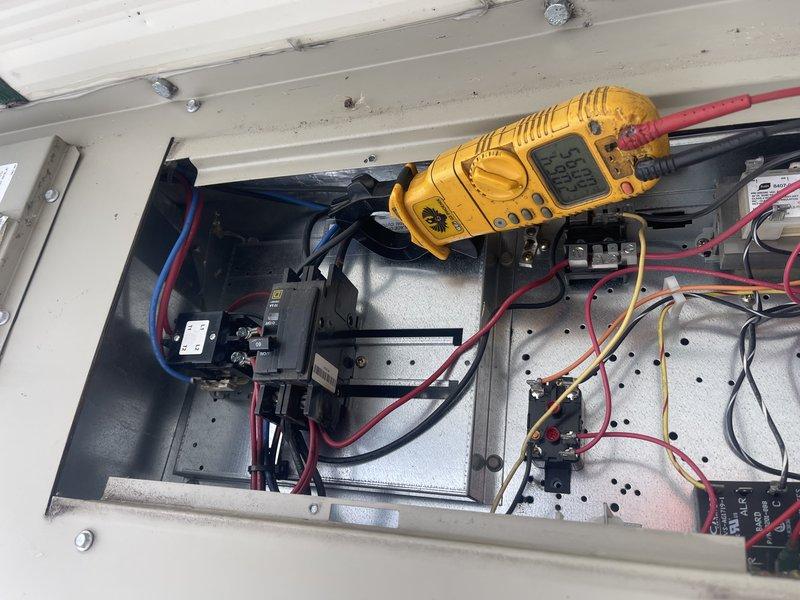 Responded to no heat complaint on rooftop unit. Diagnosed burnt wiring connections at 60A circuit breaker. Temporarily repaired and reattached damaged wires to restore heating function. Recommended replacement of circuit breaker due to wire terminal damage. Customer advised that current repair is temporary and replacement parts are needed for permanent solution.