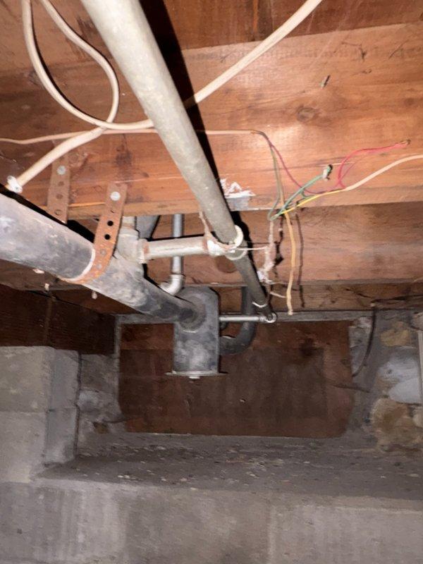 Responded to service call for lack of hot water in residence. Diagnosed clogged hot water line from water heater affecting entire home. Replaced affected section of piping in basement/crawlspace area, restoring proper hot water flow throughout the property.
