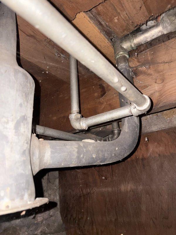 Responded to service call for lack of hot water in residence. Diagnosed clogged hot water line from water heater affecting entire home. Replaced affected section of piping in basement/crawlspace area, restoring proper hot water flow throughout the property.