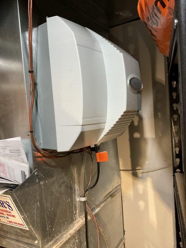 Performed scheduled furnace maintenance on 4-year-old FRP unit. Discovered and cleared completely plugged drain line that was severely restricting operation. Removed AC drain tube to clear significant blockage. Replaced plugged filter, cleaned system components, and set filter replacement reminder. Instructed homeowner on proper maintenance of humidifier drainage (currently draining into bucket) and recommended regular vinegar flush of drain line 1-2 times annually. Set humidifier pad reminder and accessed dealer system to update service records.