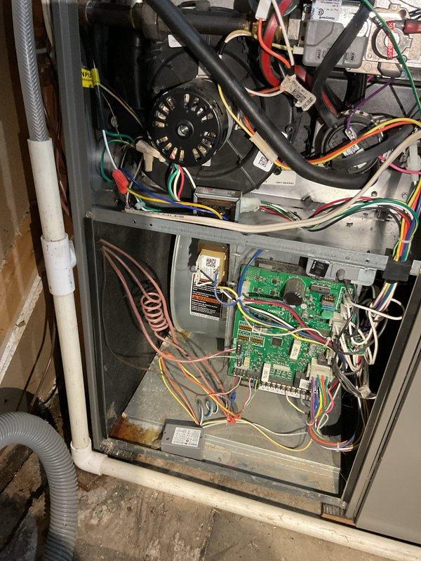 Performed scheduled furnace maintenance on 4-year-old FRP unit. Discovered and cleared completely plugged drain line that was severely restricting operation. Removed AC drain tube to clear significant blockage. Replaced plugged filter, cleaned system components, and set filter replacement reminder. Instructed homeowner on proper maintenance of humidifier drainage (currently draining into bucket) and recommended regular vinegar flush of drain line 1-2 times annually. Set humidifier pad reminder and accessed dealer system to update service records.