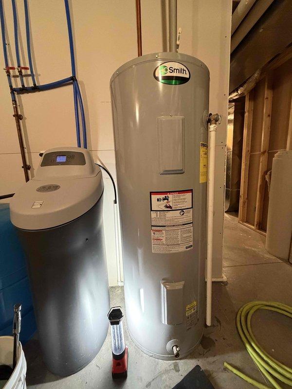Responded to emergency no-hot-water call for 10-year-old A.O. Smith 50-gallon electric water heater. Diagnosed faulty thermostat that had tripped after temperature fluctuation. Reset thermostat to restore operation, then performed preventative maintenance by replacing both thermostats and elements to prevent recurrence of the issue.