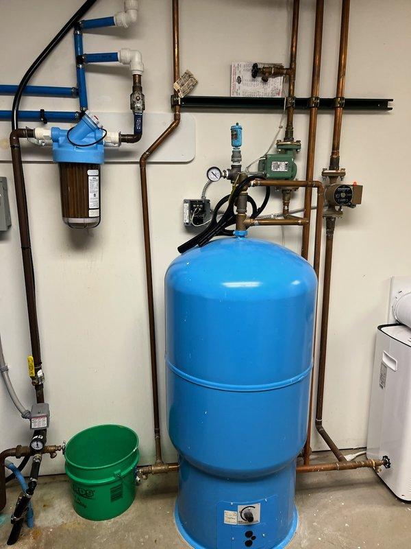 Diagnosed no hot water issue in 29-year-old water heater system. Inspected the WellXtrol pressure tank and Gibson's Water Care filtration system. Determined commercial core water heater had failed due to age; recommended replacement options to customer.