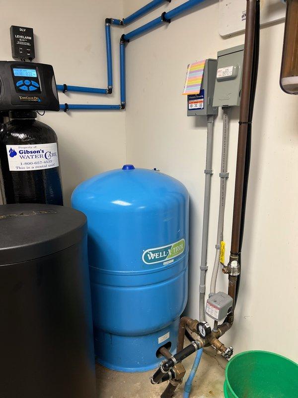 Diagnosed no hot water issue in 29-year-old water heater system. Inspected the WellXtrol pressure tank and Gibson's Water Care filtration system. Determined commercial core water heater had failed due to age; recommended replacement options to customer.