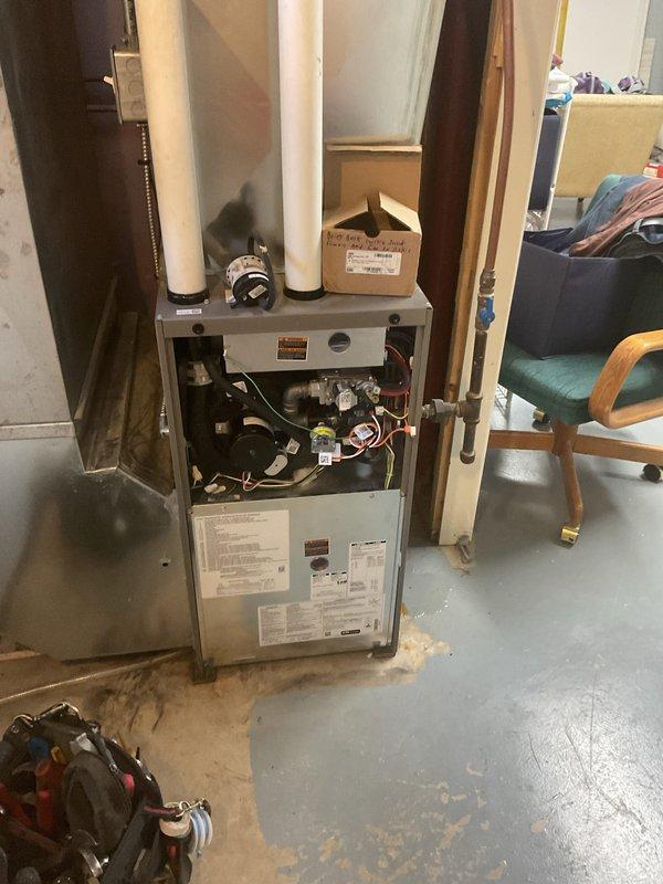 Diagnosed furnace with error code E223 causing no heat condition. Identified defective low-fire pressure switch on 5-month-old unit. Installed temporary replacement switch from truck inventory to restore heating function. Permanent replacement parts have been ordered and will be installed on follow-up visit. All work covered under manufacturer warranty.