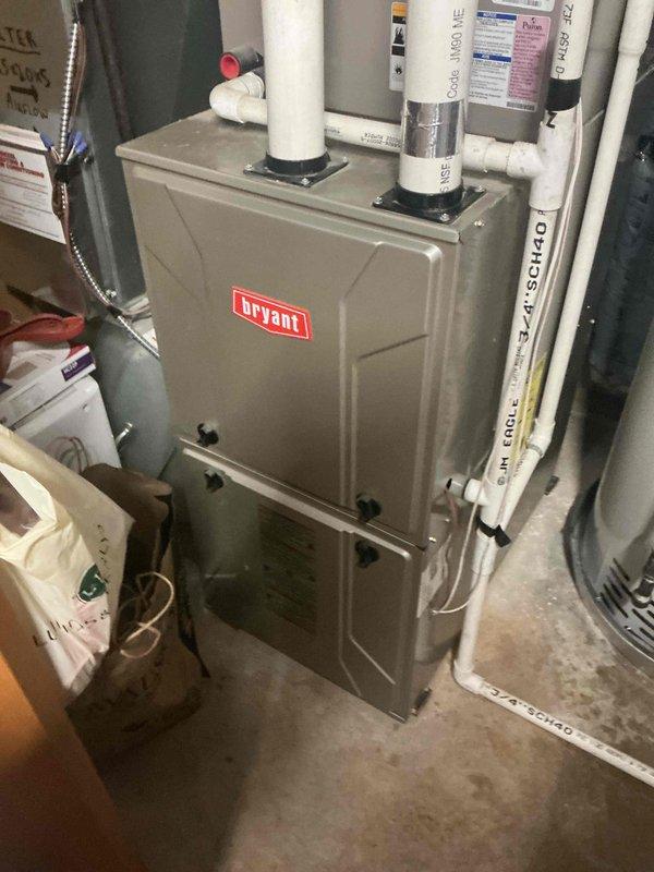 Responded to emergency water leak report where bathroom water was penetrating through ceiling and exhaust fan in lower level. Upon inspection and documentation of electrical panel and HVAC system, determined source was not plumbing-related but rather a roofing issue allowing water infiltration. No plumbing repairs were necessary; recommended customer contact roofing professional for proper resolution.