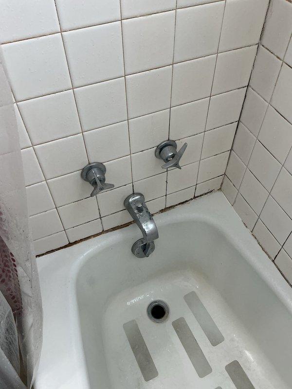 Responded to customer complaint regarding Kohler two-handled bathtub faucet that would not shut off properly. Diagnosed the issue as a faulty shower valve rather than the previously replaced cartridge. Provided estimate for necessary parts and scheduled follow-up repair to resolve the continuous water flow problem.