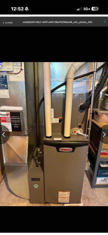 Responded to service call for non-operational garbage disposal. Upon inspection, determined motor was seized but not damaged. Successfully restored function by manually rotating motor with disposal key and resetting unit. Noted disposal is approximately 10+ years old with signs of gumming. Provided replacement options to customer for future consideration.