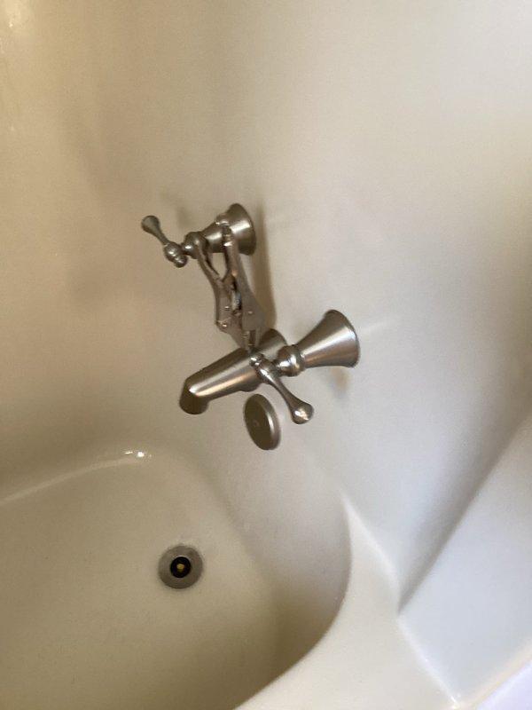 Diagnosed and replaced failed tub spout diverter that was preventing proper shower function. Customer supplied the replacement tub spout which was successfully installed and tested to ensure proper diversion of water flow from tub to shower head.