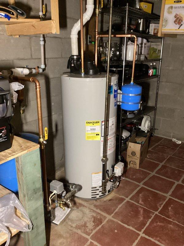 Performed furnace tune-up on aging FRP unit, discovering multiple issues including water leakage in upper cabinet, disconnected condensate hose, failing inducer motor capacitor (2.8μF of 4μF rated), and blower motor with excessive play and underperforming capacitor (3.6μF of 7.5μF rated). Heat exchanger inspection showed no compromises; system operated within parameters with 65° temperature rise. Recommended filter replacement and discussed estimates for both motor replacements as well as complete system upgrade options due to unit condition and age.