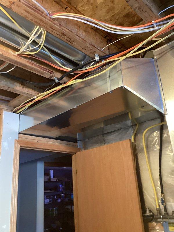 Corrected an installation oversight by adding a register to the furnace plenum in the utility room, which resolved the lack of heat distribution to this area. Sourced necessary materials from local hardware supplier and completed the installation, restoring proper airflow and heating functionality to the previously bypassed space.