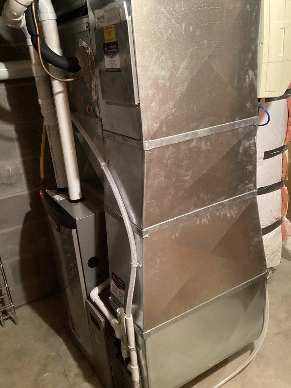 Performed scheduled maintenance on 2-year-old FRP furnace. Completed comprehensive tune-up including inspection of heat exchanger (no compromises found), verification of electrical components within specifications, and confirmation of clear routine lines. System operated properly during 15-minute test run with appropriate gas pressures and 75-degree temperature rise. Noted humidifier pad was clean but air filter requires replacement; customer will order replacement filter separately.