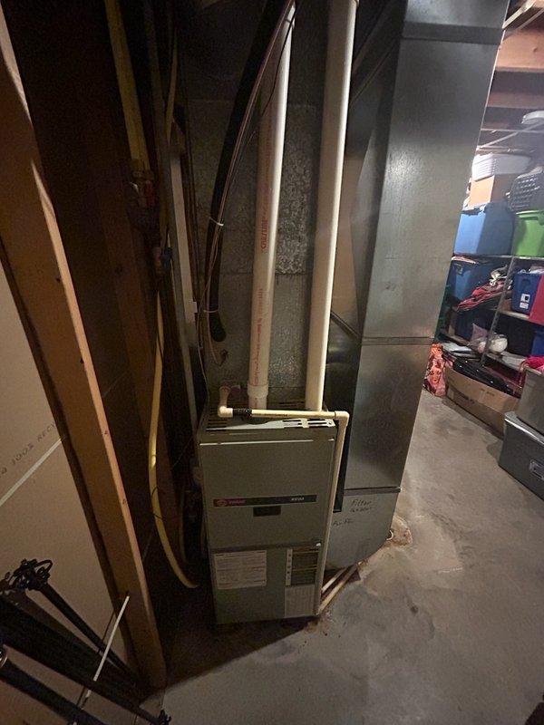 Responded to no heat call for 25-year-old natural gas furnace. Diagnostic testing revealed system failure with error code 4 (open limit switch). Visual inspection identified cracks exceeding one inch in the heat exchanger, excessive play in the blower wheel with out-of-spec capacitor, and overheating inducer motor. Due to multiple critical safety issues, the unit was red-tagged and customer was advised to consider replacement options.