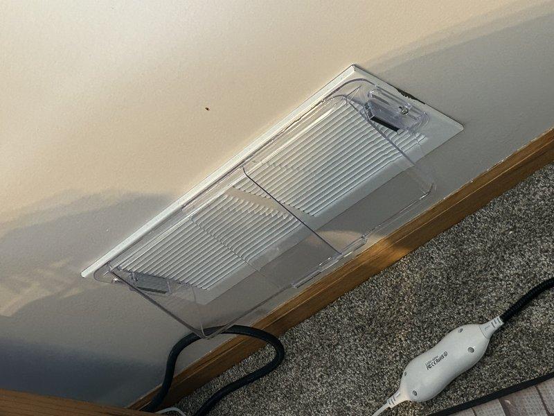 Responded to no heat complaint where customer reported thermostat running but insufficient airflow. Diagnosed system was operational but found potential overheating issue with air temperature in ductwork reaching 140-145°F approaching limit switch threshold (160°F). Determined primary cause was restricted airflow due to closed vents throughout bottom floor. Performed system check including drain inspection and flame sensor cleaning. Noted inducer motor exhibiting noise and provided replacement recommendation. Advised customer to keep all vents open and adjust thermostat settings rather than closing vents to maintain proper system operation and reduce stress on blower motor.