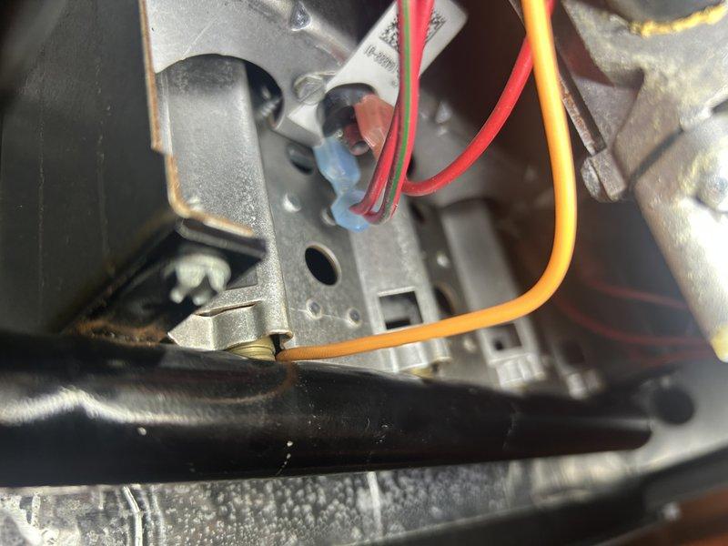 Responded to no heat call for 12-year-old furnace displaying code 11 (failed ignition). Diagnostic inspection revealed pinched igniter wire between burner manifold and assembly, preventing proper spark. Removed igniter, performed cleaning, and reinstalled component, which restored normal ignition sequence. System tested through multiple cycles with successful operation. No parts replacement required at this time.