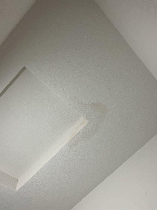 Inspected property for reported water leaks. Identified water staining on closet ceiling that appears to be related to possible roof leak or attic moisture issue. Noted that staining appeared after roof replacement approximately 2 years ago. Recommended customer contact their roofing contractor to inspect for potential missed roof vent or leak point in recently installed roof.