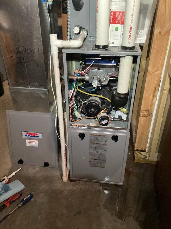 Responded to service call regarding water leakage from furnace previously serviced during routine maintenance. Investigated condensate trap leakage, disassembled and applied silicone to gasket, though leakage persisted. Further inspection revealed potential pinholes developing in heat exchanger. Informed customer of findings and advised replacement of condensate box and gaskets pending their approval.