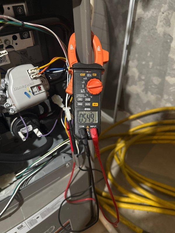 Performed comprehensive furnace tune-up as part of combined service call. Inspected electrical connections with clamp meter, confirming proper amp draw (0.49) on Honeywell control board. Furnace verified to be in good working condition with no operational issues or concerns identified.