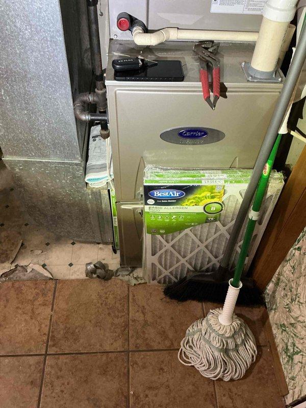 Replaced a damaged washer box, installed a new 10-inch whole house water filter system, and upgraded existing gate valve to a ball valve to address leak in the main water supply pipe. All components were properly connected to the existing copper pipe network with appropriate fittings and pressure tested to ensure system integrity and eliminate the previously observed water mist issue.