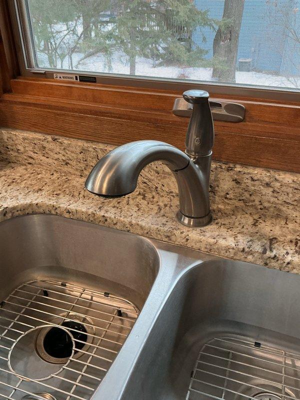 Provided estimate to customer for installation of customer-supplied Delta fixtures including kitchen faucet, bathroom faucet, and shower components. Inspected current installations and discussed options, with customer indicating they will compare our quote with other estimates before making a decision.