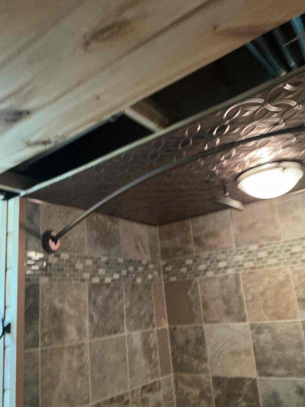 Responded to water leak issue where water was penetrating through bathroom ceiling. Inspection revealed leaking faucet body in upstairs sink. Successfully installed three new faucets to resolve the leak, preventing further water damage to the basement bathroom ceiling.